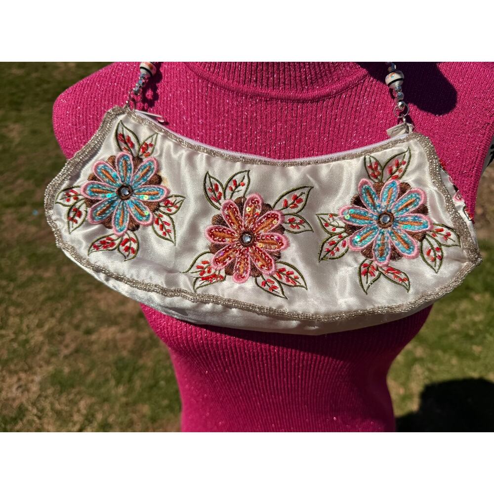 white beaded sequined zippered satin clutch bag with beaded wristlet handle